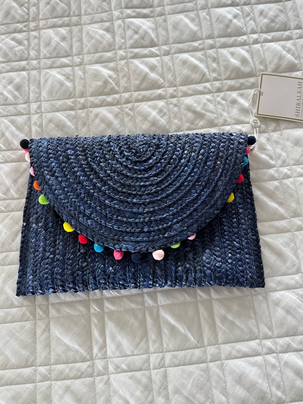 Shiraleah Navy Woven Clutch with Multicolor Pom-Poms